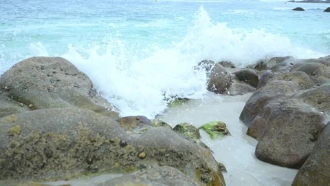Waves crashing on rocks Stock Footage 313961342