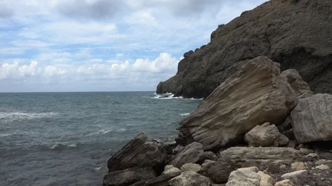 Waves crashing on rocks at low tide Black Sea Stock Footage 93307876