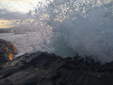 Waves crashing in the rocks Stock Photos