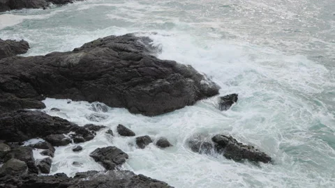 Waves crashing on rocks, rough seas, ocean waves, rugged coastline, Vancouver Stock Footage 238615882