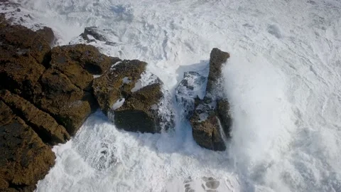 Waves Crashing Onto Rocks in slow motion Video stock 195133423
