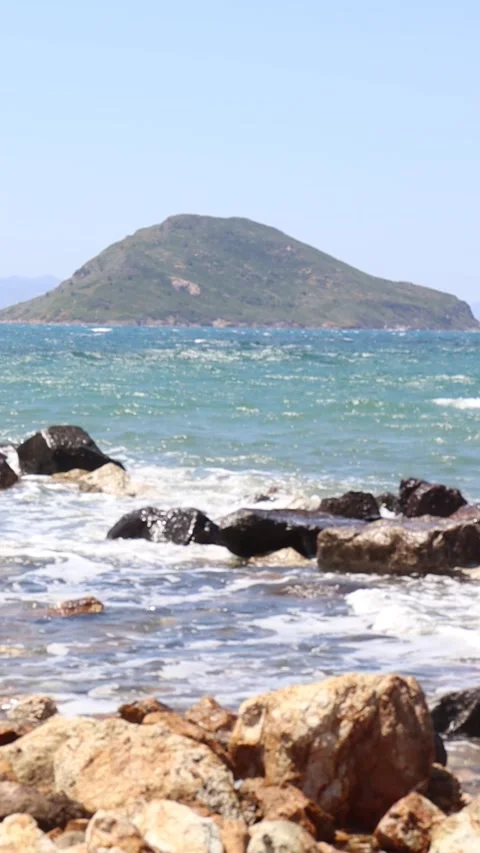 Waves Crashing on Rocks Slow-Motion (Vertical) Stock Footage 236658787