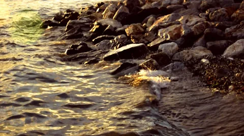 Waves Crashing On The Rocks At Sunset Stock Footage 33622179