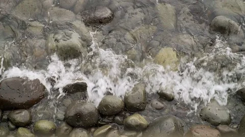 Waves Crashing on Rocks Top View Stock Footage 70377156