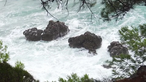 Waves Crashing on Rocky Shore. Stock Footage 255252902