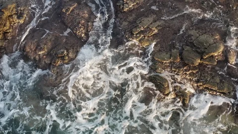 Waves crashing on rough rocks. Stock Footage 118905953