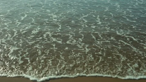 Waves Crashing on Sandy Beach Video stock 86524175