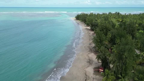 Waves crashing on sandy beach in puerto rico (luquillo surf coast coastline) Stock Footage 277842452