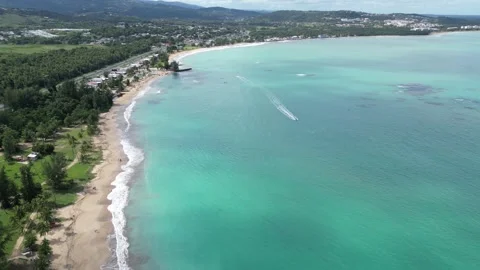 Waves crashing on sandy beach in puerto rico (luquillo surf coast coastline) Video stock 277843867