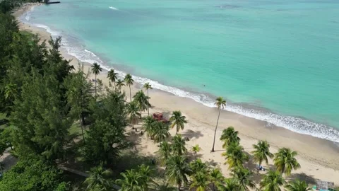 Waves crashing on sandy beach in puerto rico (luquillo surf coast coastline) Video stock 277844946