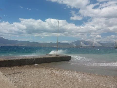 Waves crashing into seafront Stock Photos