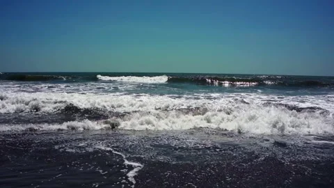 Waves Crashing on the Seashore Stock Footage 293888921