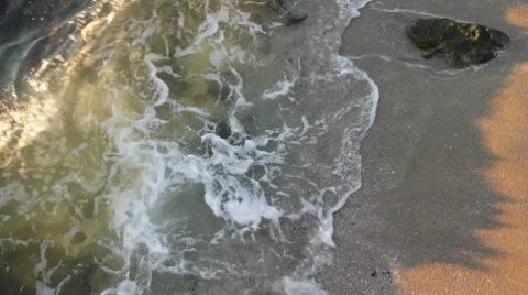 Waves crashing on the shore Stock Footage 7753735