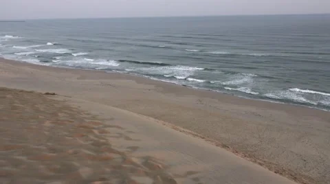Waves crashing on the shore Stock Footage 58954784