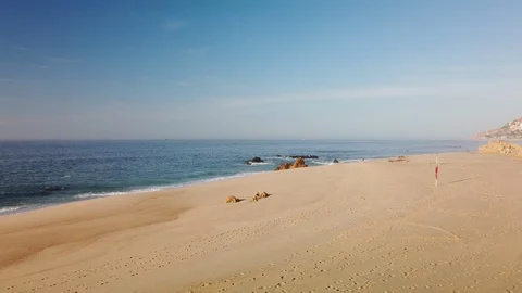 Waves crashing on shore at Sunset. Stock Footage 113989007