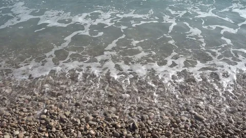 Waves crashing in slow motion against the rock Stock Footage 124692282