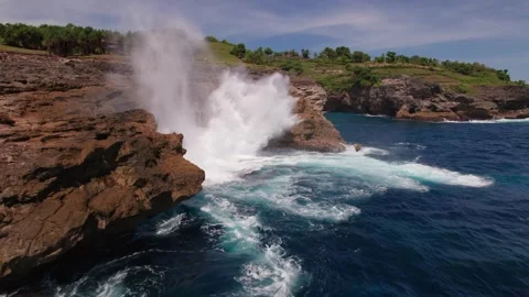 Waves Crashing at Smoke Beach Cliffs, Nusa Penida Stock Footage 313593687