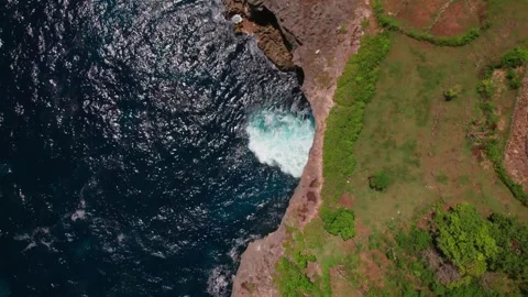 Waves Crashing at Smoke Beach Cliffs, Nusa Penida Stock Footage 313593691