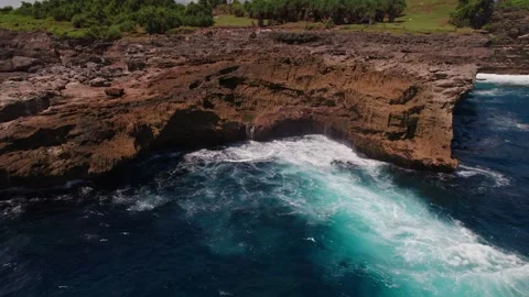 Waves Crashing at Smoke Beach Cliffs, Nusa Penida Stock Footage 313593711