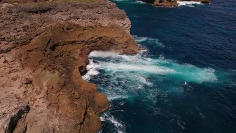Waves Crashing at Smoke Beach Cliffs, Nusa Penida Stock Footage 313593784