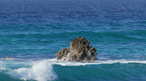 Waves Crashing on Stone Beach Stock Footage 45701350