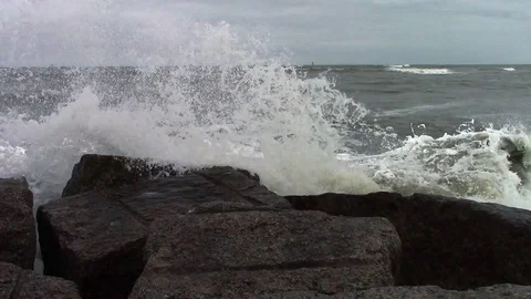 Waves Crashing on a Stormy Texas Jetty Stock Footage