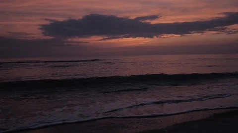 Waves Crashing at Sunset on the Beach - Slow Motion Stock Footage 91737059