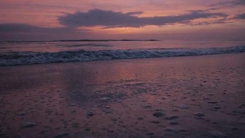 Waves Crashing at Sunset on the Beach - Slow Motion Video stock 91737129
