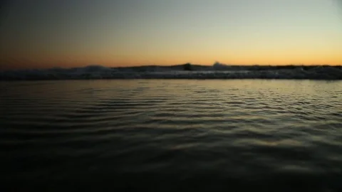 Waves Crashing At Sunset Stock Footage 73304416