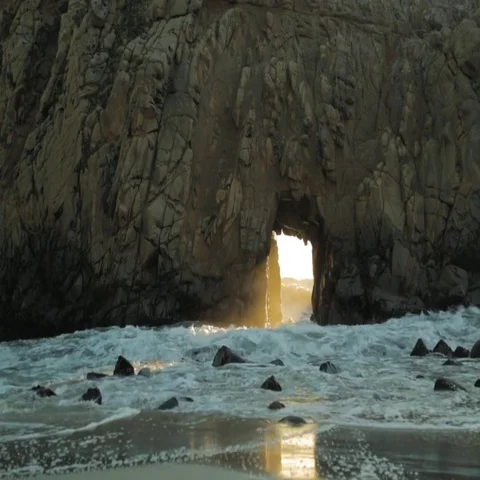 Waves crashing through Keyhole Arch at Pfeiffer Beach in California Stock Footage 69454721