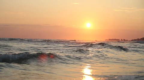 Waves Crashing Under the Sunset Stock Footage 48700290