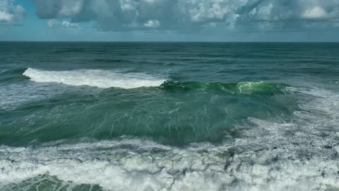 Waves Crawling Over Foamy Surface. Aerial Wide Shot Stock Footage 256096184
