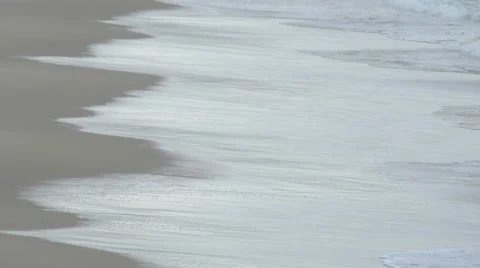 Waves create a pattern in the surfline at the beach. 動画素材 68015590