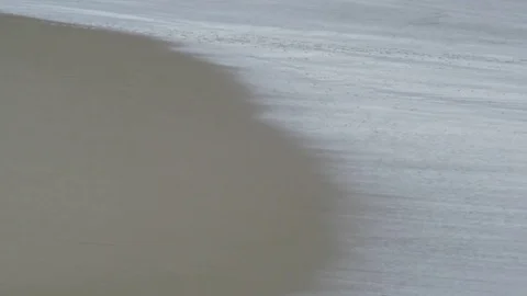 Waves create a pattern in the surfline at the beach. 動画素材 71274630