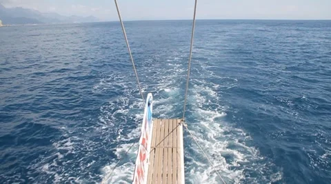 Waves creating screws of the ship at movement Stock Footage 7746885