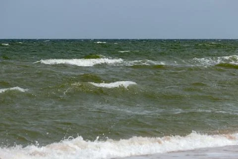 Waves with crests on the surface of the sea Stock Photos