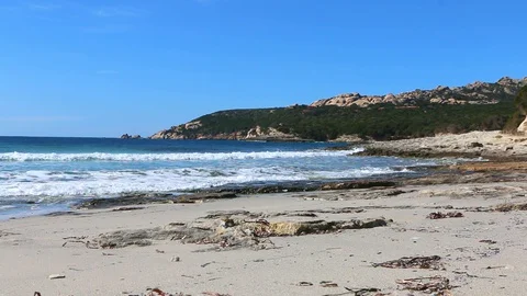 Waves crushing on beach stones Stock Footage 128933258