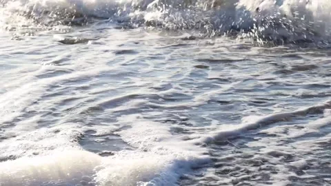 Waves Crushing the Pebbles on the Sandy Beach Stock Footage 267694765