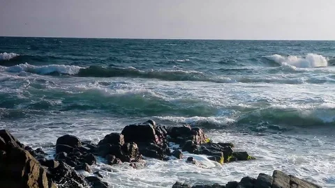 Waves crushing rocks on the coast Stock Footage 123660504