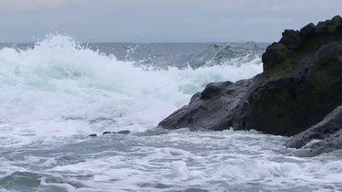Waves crushing into the rocks Stock Footage 155379622