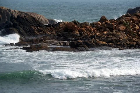 Waves crushing into the rocks 写真素材