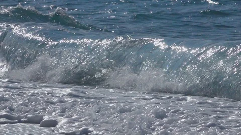 Waves crushing on the seashore Stock Footage 124909429