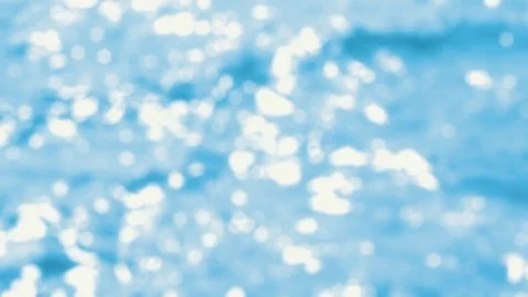 Waves  - defocused shot of a wavy water surface on a sunny day - seamless loop Stock-Footage 78076576
