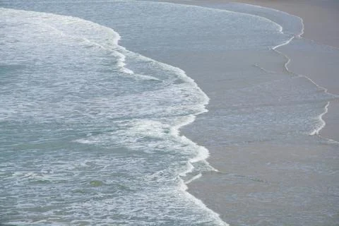 Waves Dissipating On A Beach Stock Photos