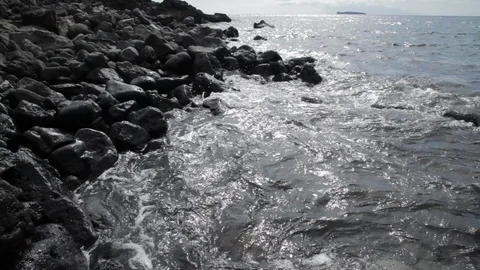 Waves dramatically wash over rocks Hawaii Stock Footage 90961384