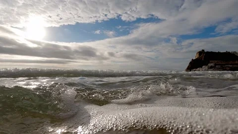 The waves at the edge of the beach and underwater Stock Footage 227186079