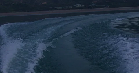 Waves from the engine on the water super slow motion Stock Footage 241511302