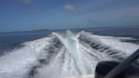 Waves from the engines of a high-speed boat Video stock 295384983