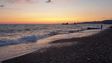 Waves on the evening beach Stock Footage 116593226