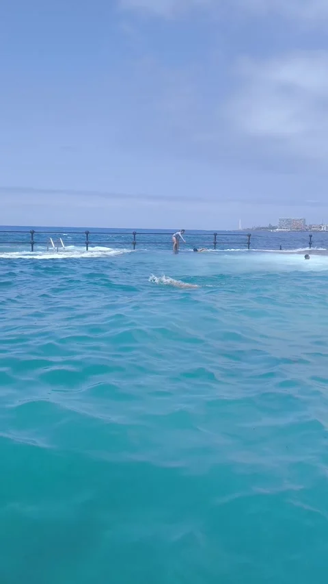 Waves explode against Bajamar natural pools. Stock Footage 329188578